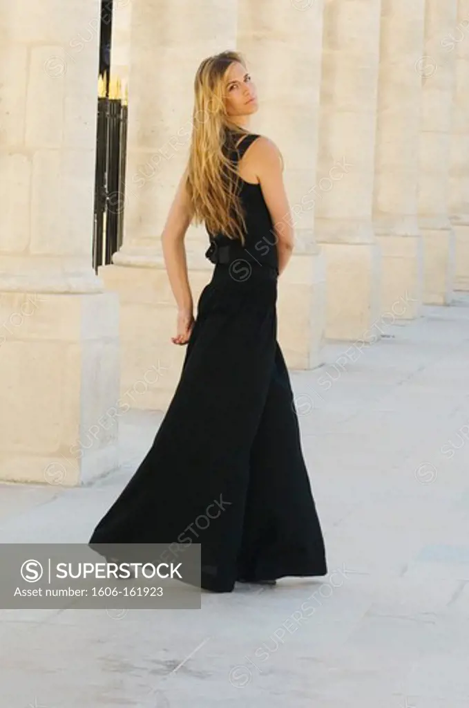 Woman in black evening gown