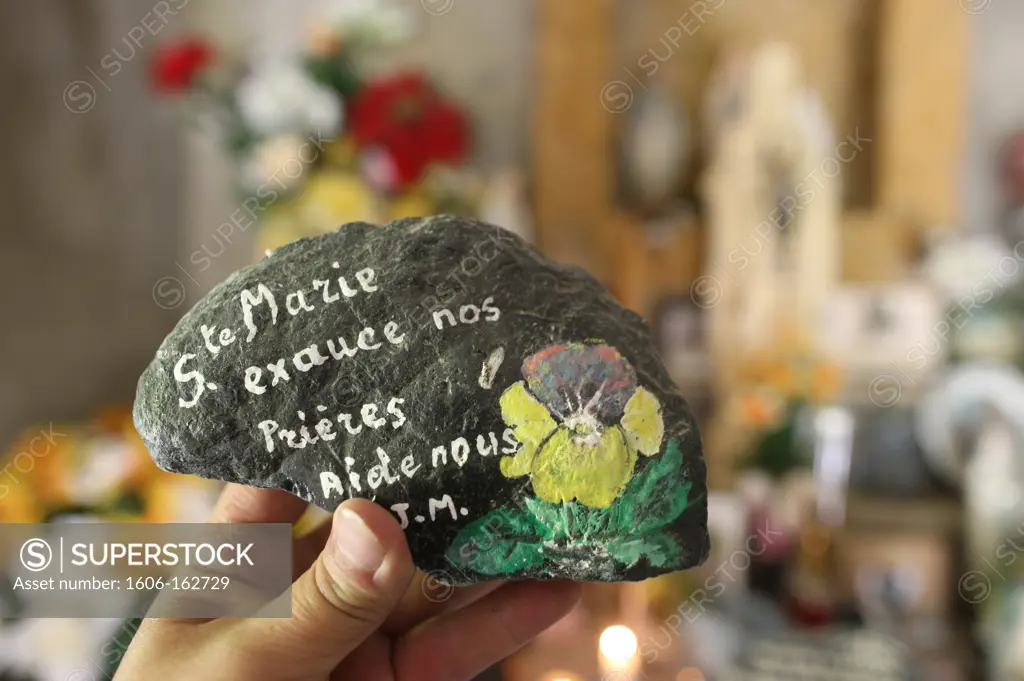 Prayer on a stone Les Contamines. France. (Les Contamines, Haute-Savoie, France)