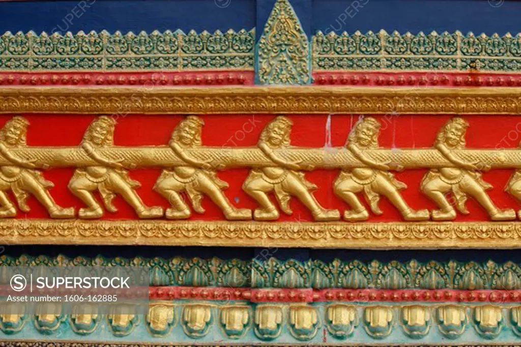 Wat Hawari sculpture detail : scene from the Ramayana : churning of the sea of milk . Kampot. Cambodia. (Kampot, Kampot, Cambodge)