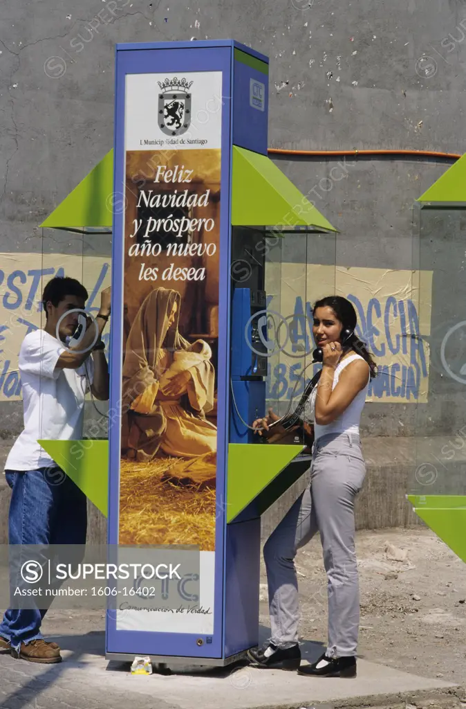 Chile, Santiago, 2 persons in phone booths