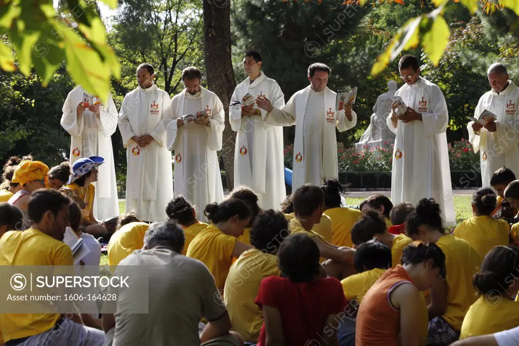 Italian priests and pigrims in Retiro Park during World Youth Day . Madrid. Spain.