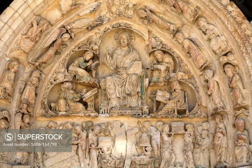 Fleury abbey basilica north gate tympanum : Christ in glory surrounded by evangelists . Saint-Benoît sur Loire. France.