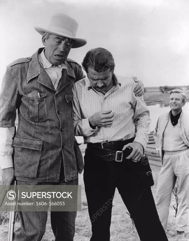 On the set, John Huston directs Audie Murphy , Le vent de la plaine , 1960 directed by John Huston United Artists