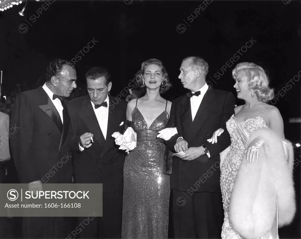 New-York, November 1953 ; at the premiere of ""How to Marry a Millionaire"" with George Bowser (General Manager, Fox West Coast Theatres Corporation), Humphrey Bogart, Lauren Bacall, Nunally Johnson and Marilyn Monroe.