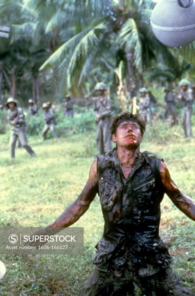 Willem Dafoe , Platoon , 1986 directed by Oliver Stone Orion Pictures Corporation
