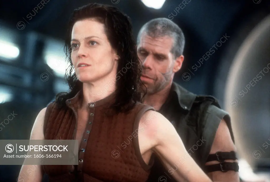 Sigourney Weaver and Ron Perlman , Alien: Resurrection , 1997 directed by Jean-Pierre Jeunet Twentieth Century Fox Film Corpo