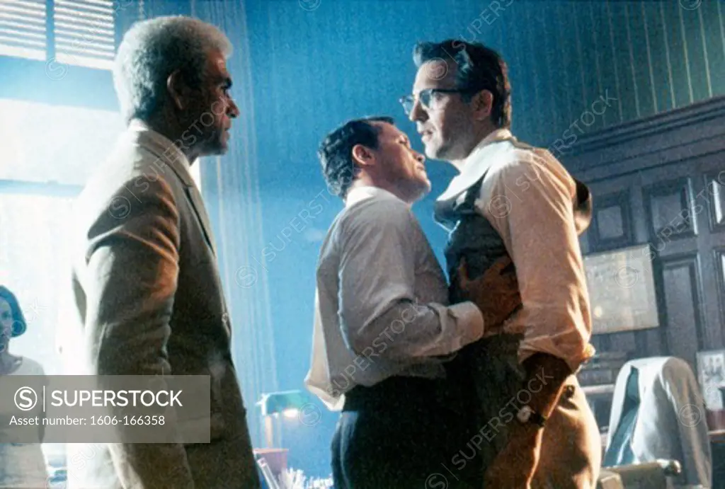 Tommy Lee Jones, Michael Rooker and Kevin Costner , JFK , 1991 directed by Oliver Stone WARNER BROS. PICTURES