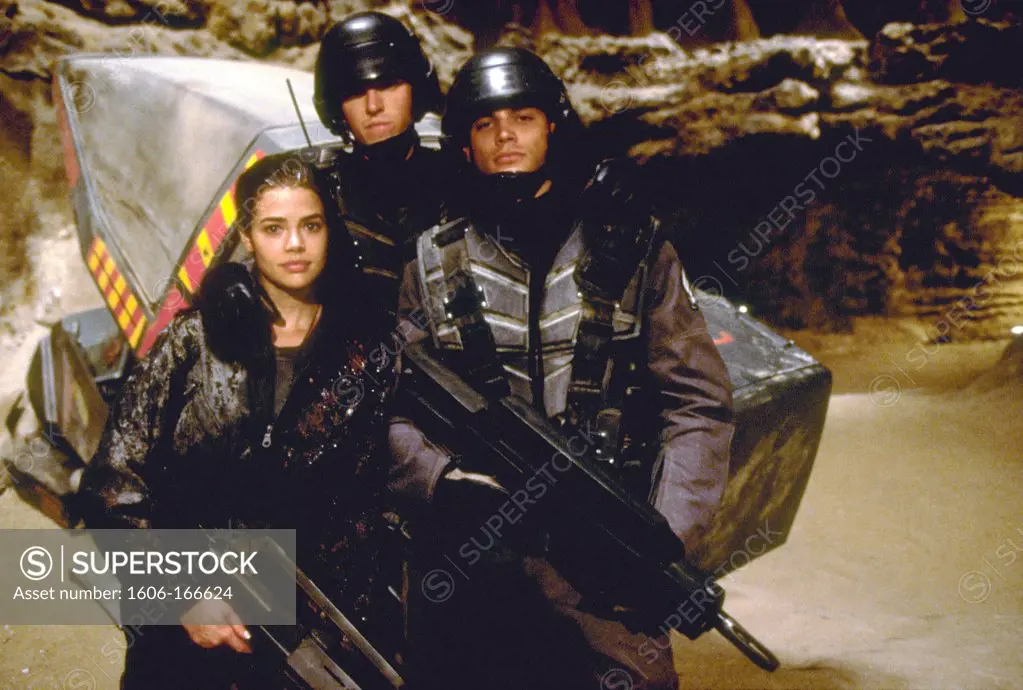 Denise Richards, Jake Busey and Casper Van Dien , Starship Troopers , 1997 directed by Paul Verhoeven TriStar Pictures