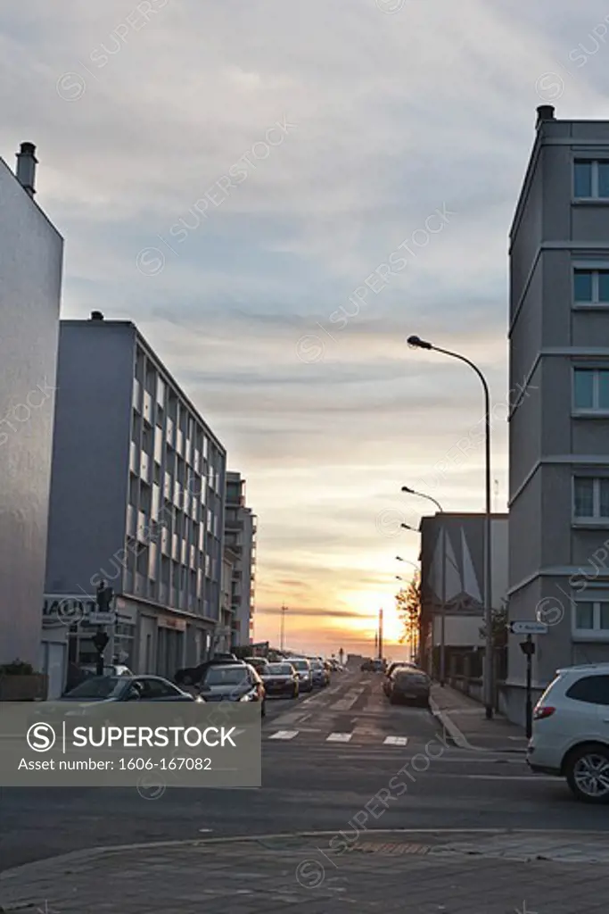 France, Le Havre, street close to the harbor at sunset