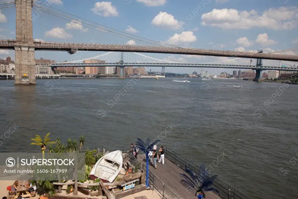 New York - United States, the water taxi beach, Manhattan and Brooklyn bridge on East river