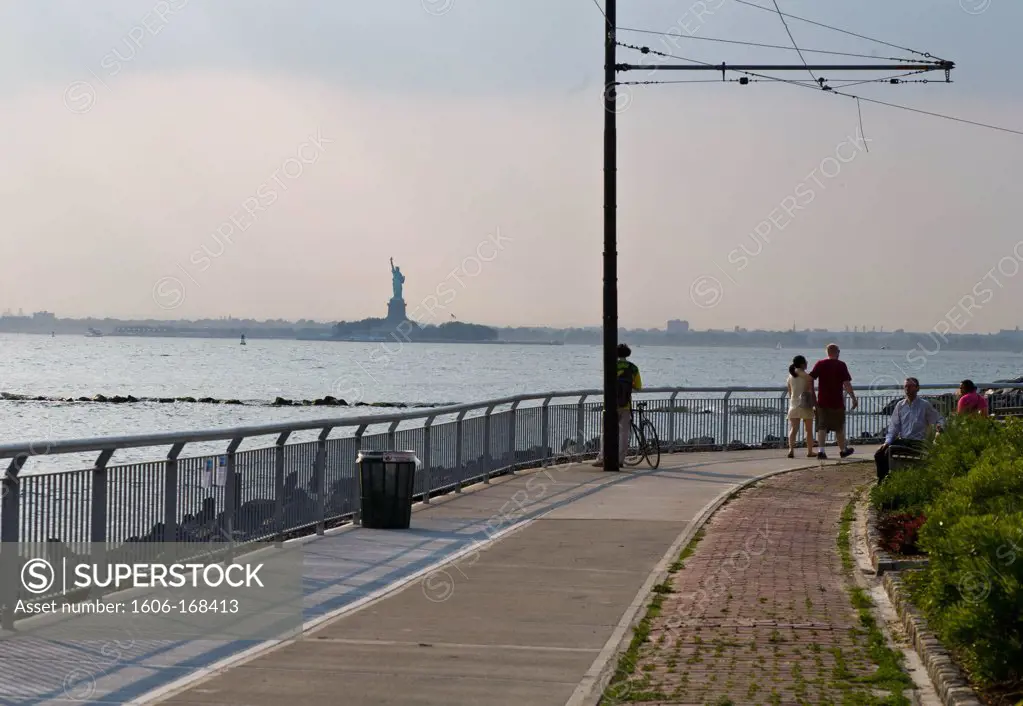 New York - United States, Statue of Liberty view from Red Hook, Brooklyn, the old docks are becoming a trendy area, old tramway