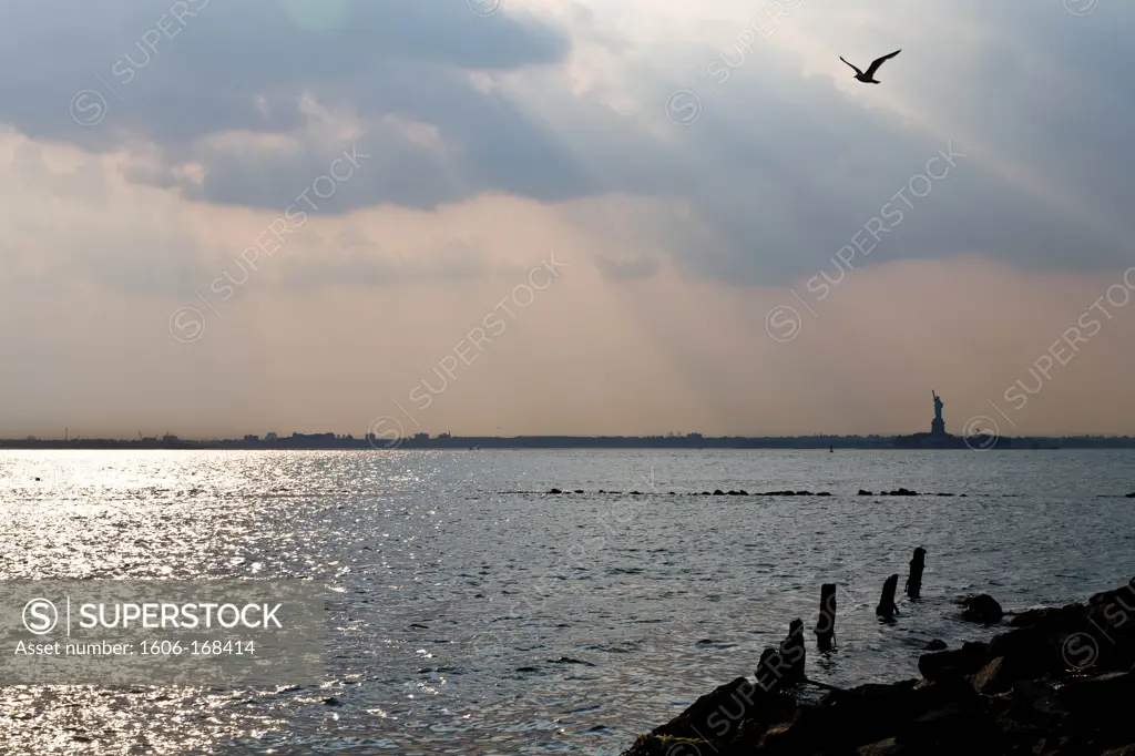 New York - United States, Statue of Liberty view from Red Hook, Brooklyn, the old docks are becoming a trendy area, old tramway