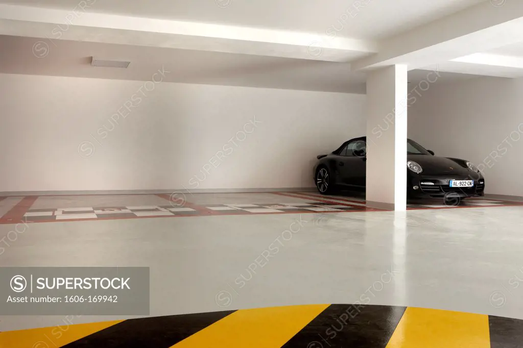 Porsche in a garage