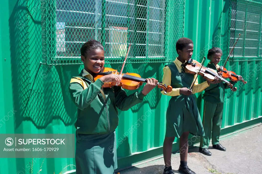 South Africa, Cape Town, Township of Nyanga, Primary School, students playing violing