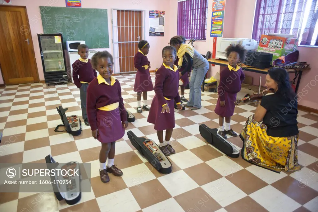 South Africa, Cape Town, Township of Gugulethu, Primary school, students ready to play violin