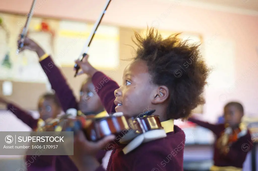 South Africa, Cape Town, Township of Gugulethu, Primary school, students playing violin