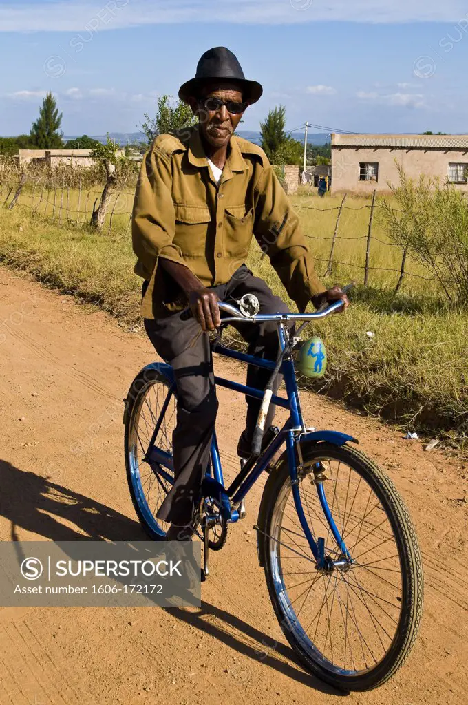 Africa, South Africa, Mpumalanga Province, KwaNdebele, Ndebele tribe, Mabhoko village, Frans Masango on his bike