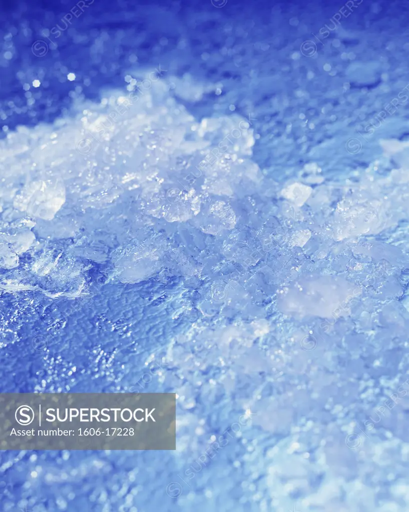 Close-up of crushed ice on blue background