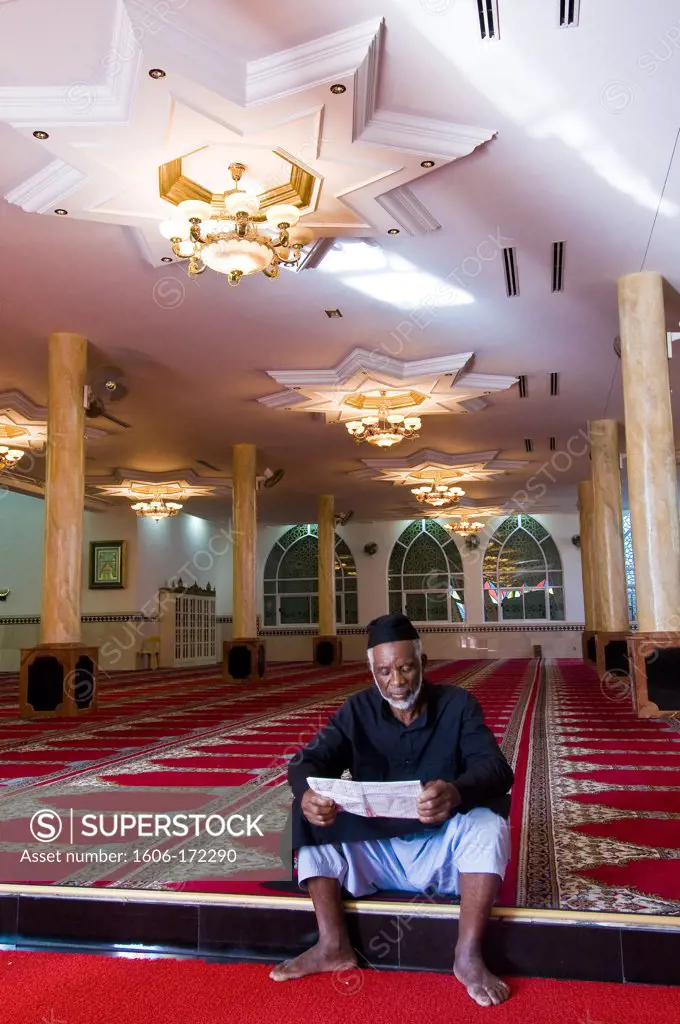 Africa, Mozambique, Maputo Province, capital Maputo, the Jumma Masjid mosque, the Muslim Abdul Ali reading