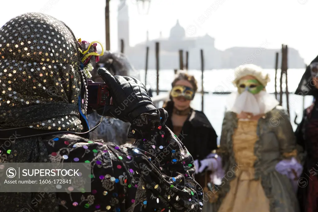 Italy, Venice, People in disguise at the carnival