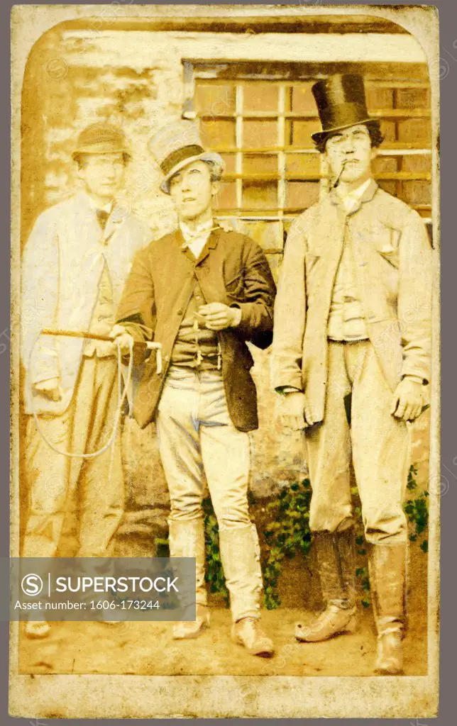 Painted ancient photograph of a group of three men circa 1900