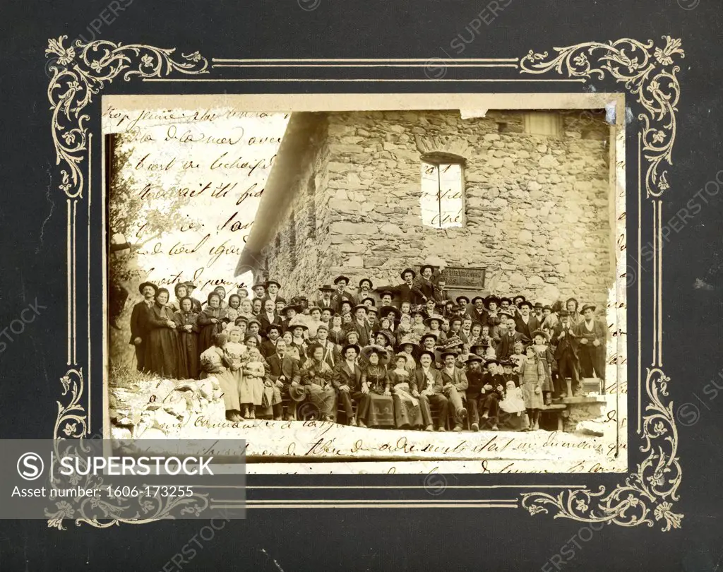 Painted and assembled ancient photograph of a very big family circa 1900