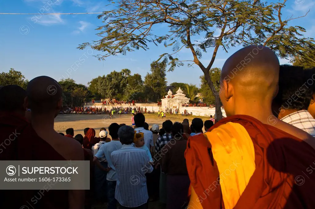 Myanmar (Burma), Mandalay State, Mandalay, bonzes and monks looking at a football match