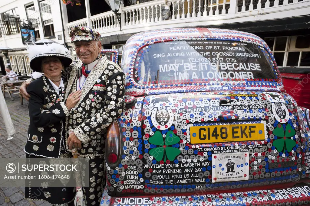 England,London,Pearly King and Queen and Decorated London Taxi