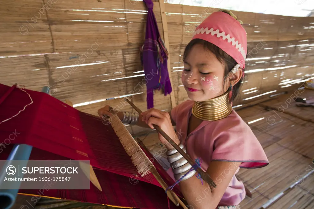 Thailand,Golden Triangle,Chiang Mai,Long Neck Karen Hilltribe Girl Weaving