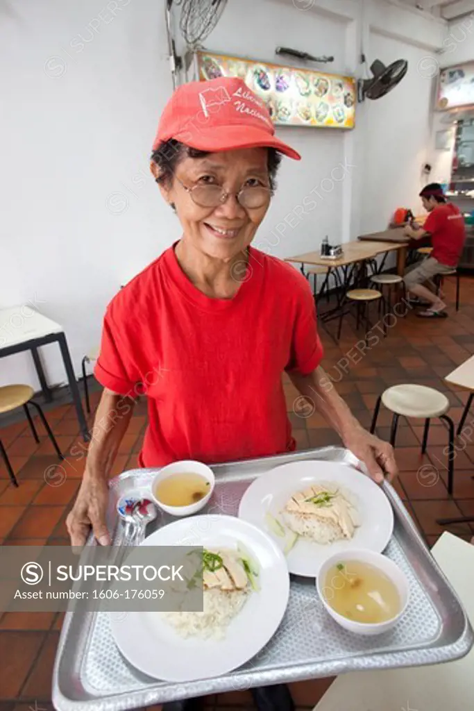 Singapore,Chinatown,Elderly Waitress Serving Chinese Food