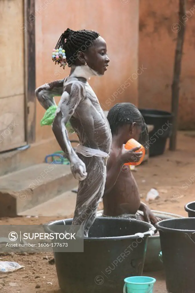 Bathing in an african house. Lome. Togo.