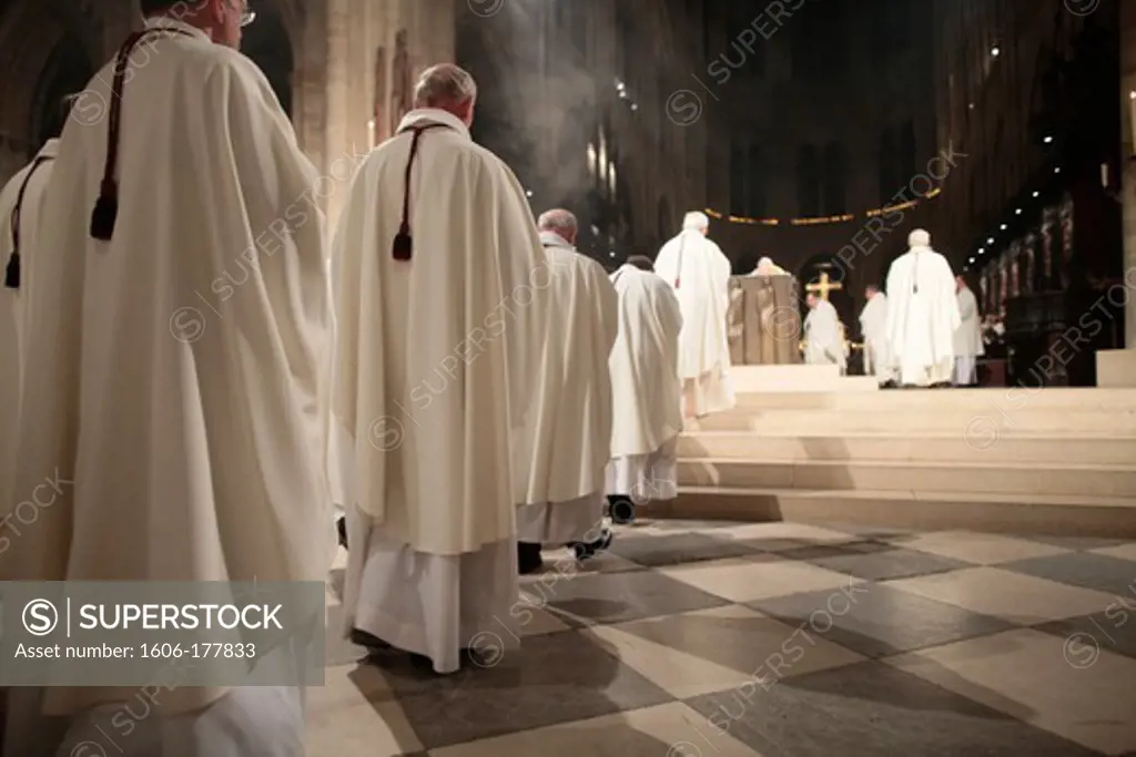 Priests' procession in Notre-Dame de Paris cathedral Paris. France.