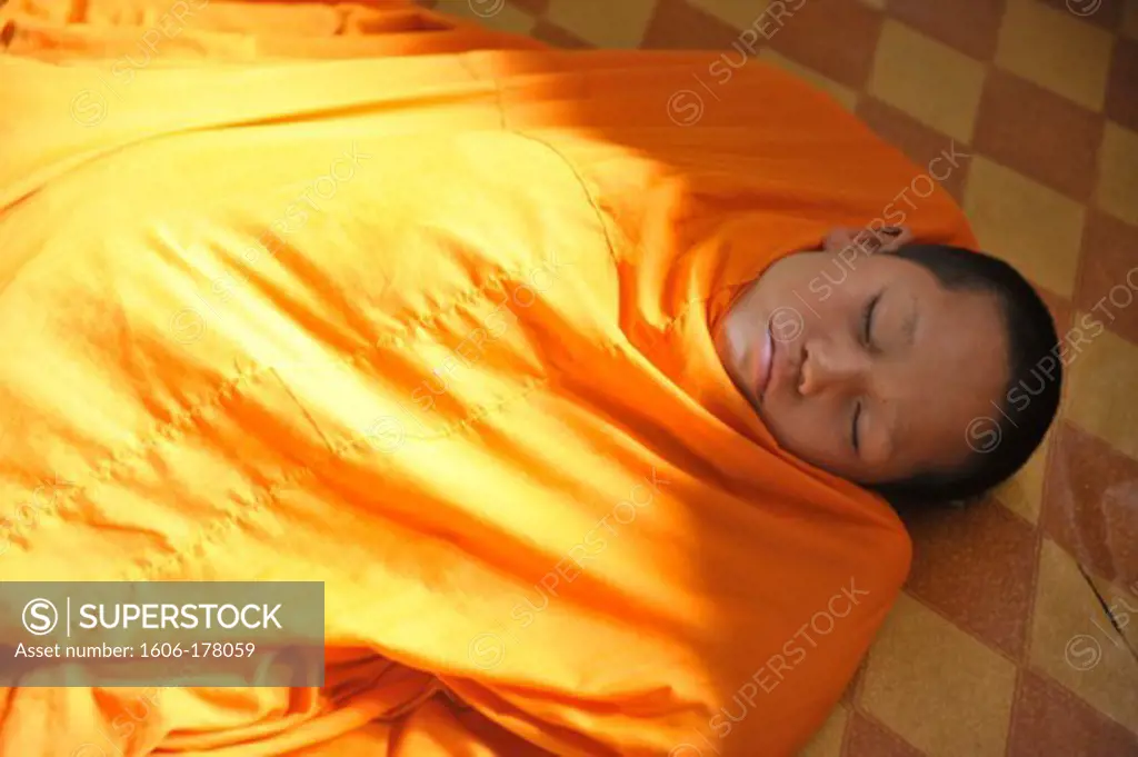 Asia, Southeast Asia, Laos, Luang Prabang, Novice monk sleeping