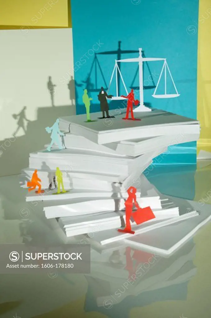 The classification of lawyers, 6 men and 1 lawyer on a pile of paper in front of a balance