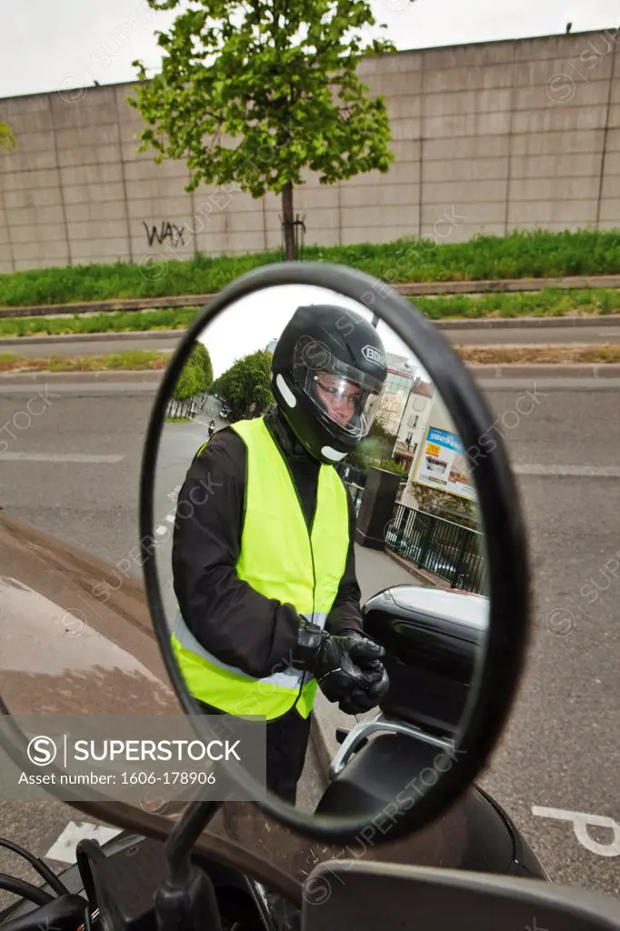 Driver with yellow security vest, Paris, France