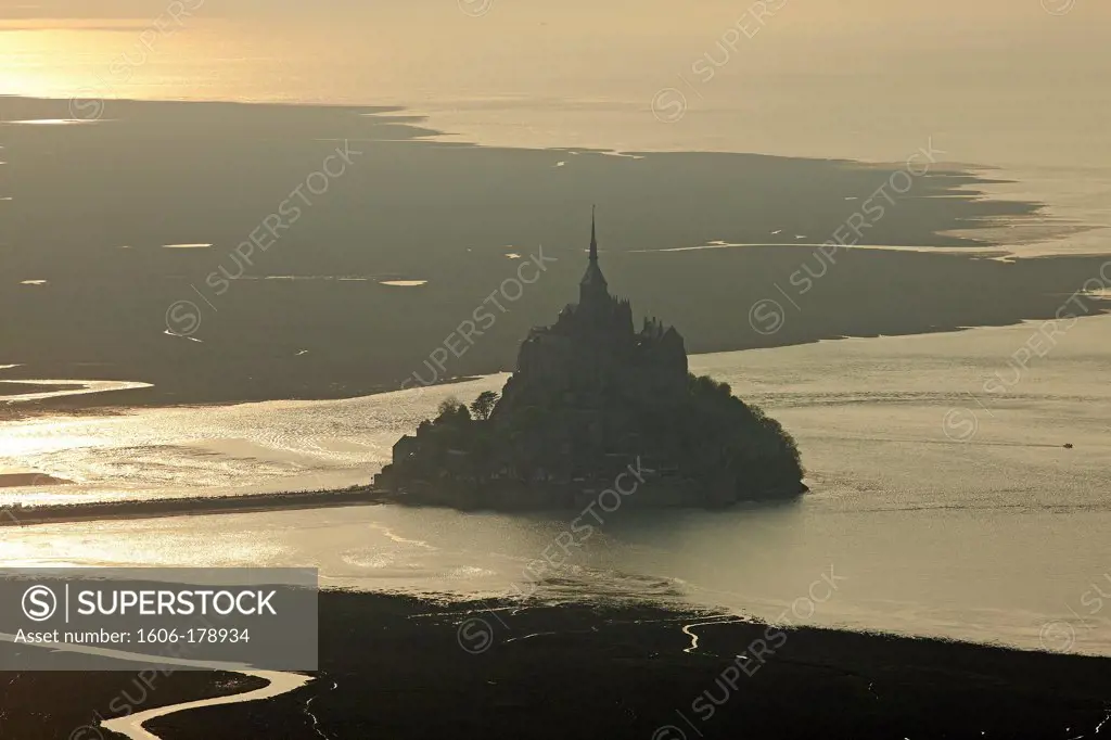 France, Ille-et-Vilaine (35), Mont Saint Michel, a World Heritage Site by UNESCO, the bay against golden day, (aerial photo),