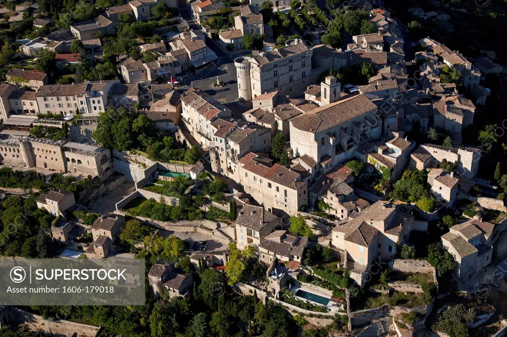France, Vaucluse, (84), Strings hilltop village of Luberon, village labeled The Most Beautiful Villages of France (aerial photo)
