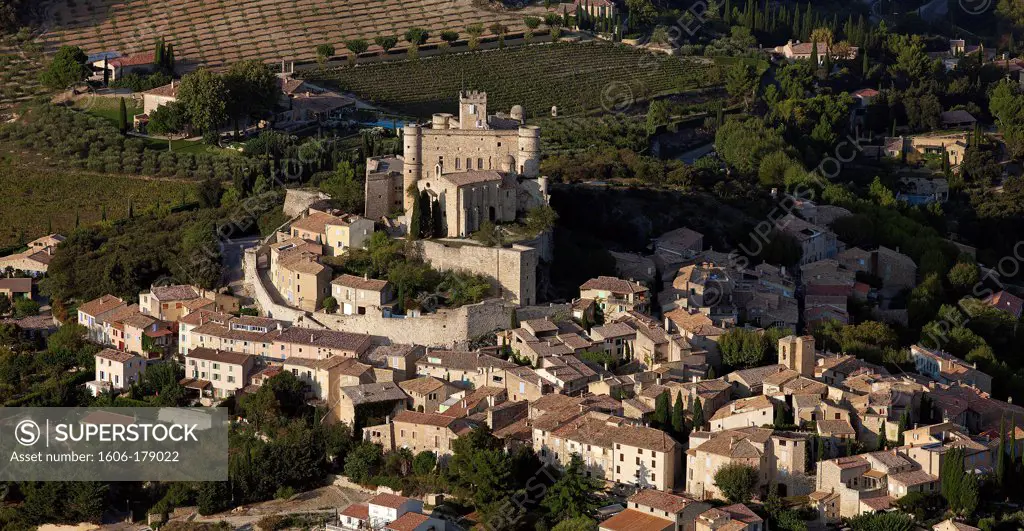 France, Vaucluse (84), Le Barroux, a village between the Laces of Montmirail and Mont Ventoux, it is dominated by a powerful castle of the twelfth century (aerial photo),