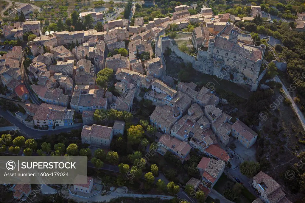 France, Vaucluse (84), Le Barroux, a village between the Laces of Montmirail and Mont Ventoux, it is dominated by a powerful castle of the twelfth century (aerial photo),