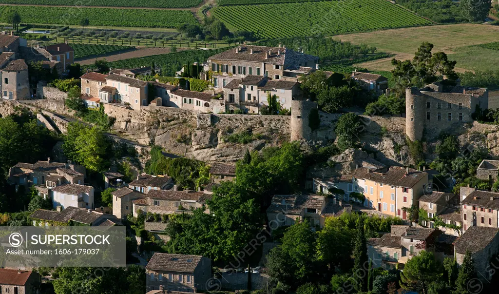 France, Vaucluse, (84), Ménerbes village perched at the foot of the Luberon, village labeled The Most Beautiful Villages of France (aerial photo),