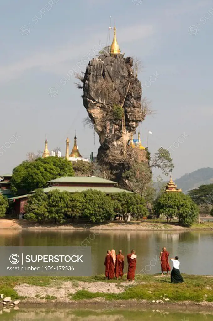 Myanmar Burma HPA AN a group of monks are standing in front of the  KYAUK KA LAT pagoda perched on an island