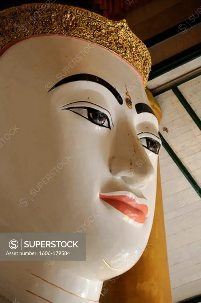 Myanmar Burma Yangon the head of a sculpture of a great Buddha in the SHWEDAGON pagoda