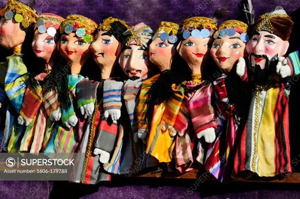 UZBEKISTAN BUKHARA puppets in a souvenirs'shop for tourists
