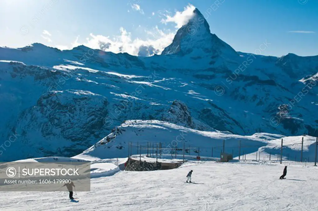 Europe, Switzerland, Alps mountains, Valais Province (VS), Gornergrat summit where the rack-and-pinion Gornergrat train stops, skiers enjoy the Cervin mount