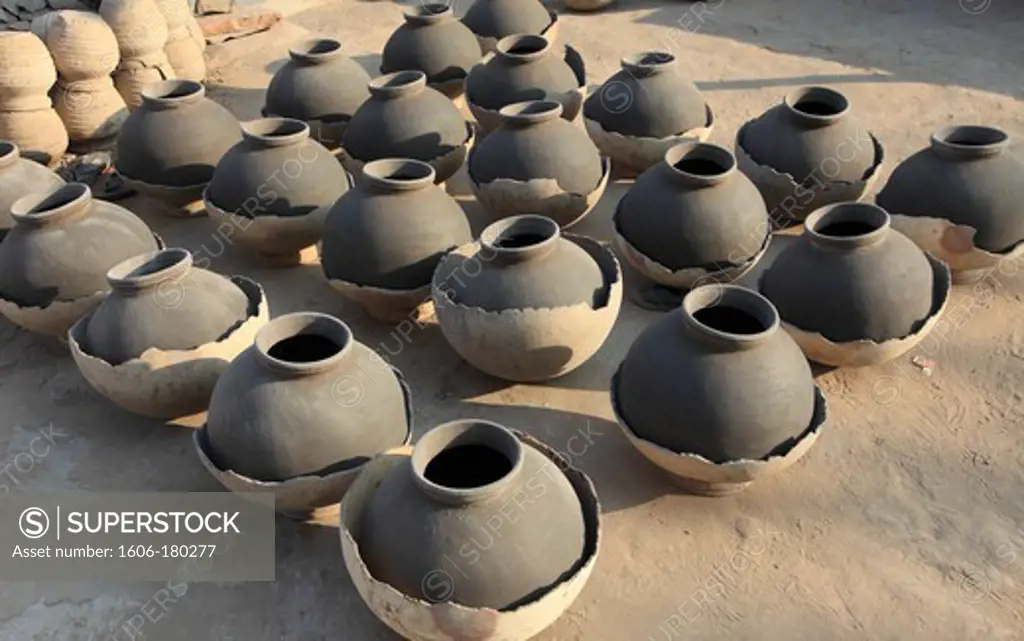 India, Rajasthan, Jodhpur, pottery drying in the sun,