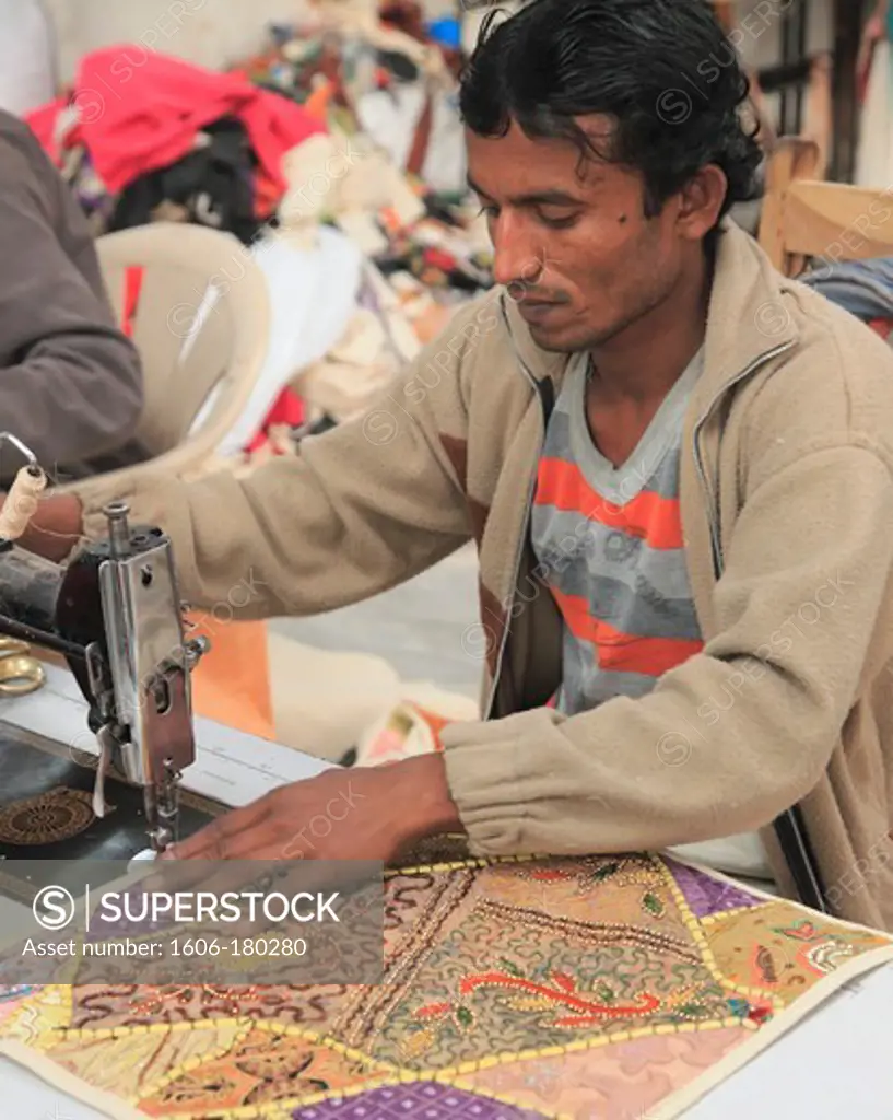 India, Rajasthan, Jodhpur, man sewing, workshop,