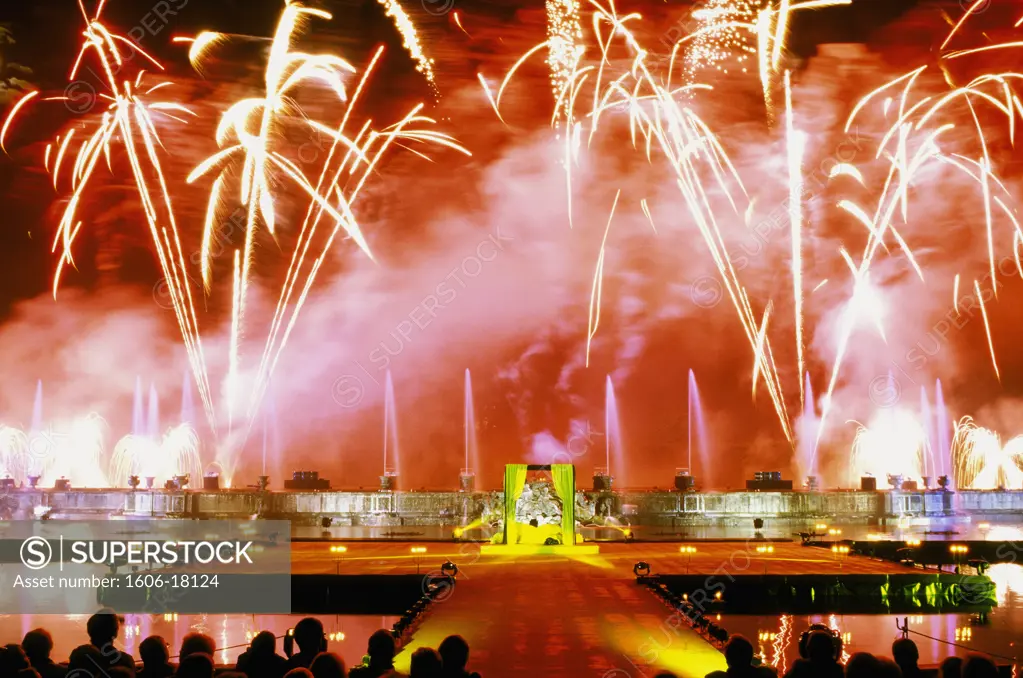 France, Paris-Ile-de-France, Yvelines, Versailles at night, fireworks on Neptune pond, podium, crowd