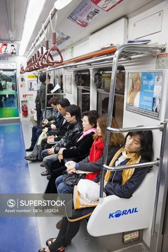 Korea,Seoul,Commuters in Subway Carriage