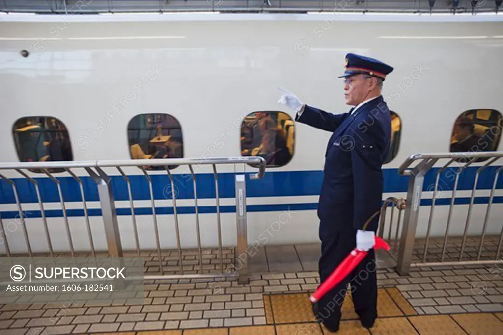 Japan,Kyoto Station,Station Platform Guard and Shinkansen