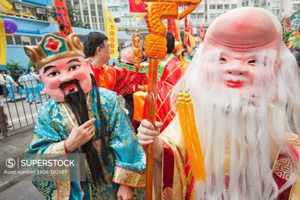 China,Hong Kong,Tai Kok Tsui Temple Fair,Parade Participants Dressed in Lucky God Costumes